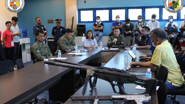 “MEMBERS OF THE DI-MAGUID GROUP LAY DOWN WEAPONS”